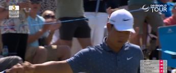 Tom Kim chips in at the third