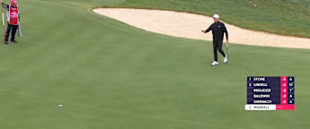 Richard Mansell drains birdie putt at the 17th