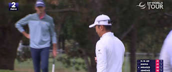 Michael Kim curls in monster birdie putt at the second