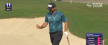 John Parry holes bunker shot at the 11th