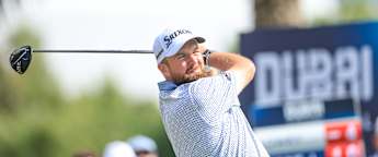 Shane Lowry and Nacho Elvira battle the elements to lead in Dubai