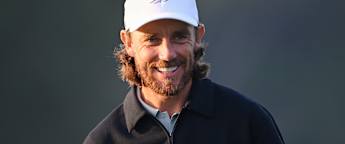 Tommy Fleetwood drains long birdie putt at the eighth