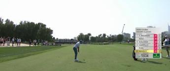 Rory McIlroy sets up birdie at the 14th