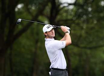 Brown eases to first round lead in Hangzhou