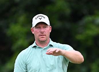Shaun Norris on top as second round suspended in Durban