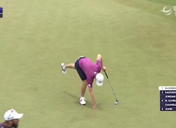 Tom McKibbin rolls in bogey at the last