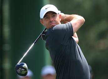 Rory McIlroy and Shane Lowry surge into contention