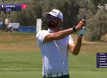 Francesco Laporta throws dart at the seventh