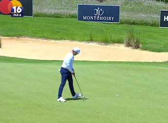 Schaper holes birdie putt at the 16th