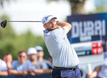 Shane Lowry and Nacho Elvira battle the elements to lead in Dubai