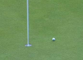 Dan Bradbury hits an unusual chip at the fifth