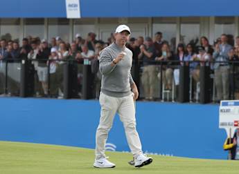 Rory McIlroy cheering on Shane Lowry to secure victory on home soil