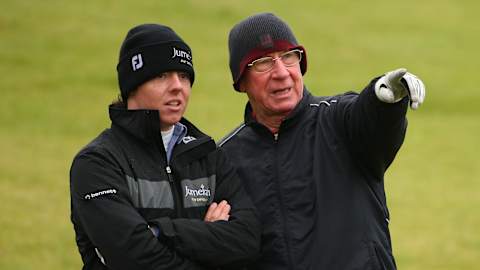 Manchester United fan Rory McIlroy with club great Sir Bobby Charlton