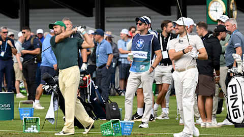 Reality stars Spencer Matthews and Mark Wright warm up on the range