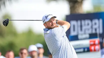 image: Shane Lowry and Nacho Elvira battle the elements to lead in Dubai