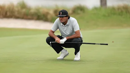 image: Why does Eugenio Chacarra putt with a glove on?