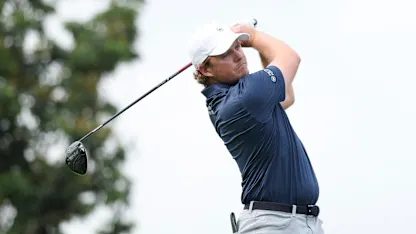 image: Eddie Pepperell focusing on scorecard over Tour card in New Delhi