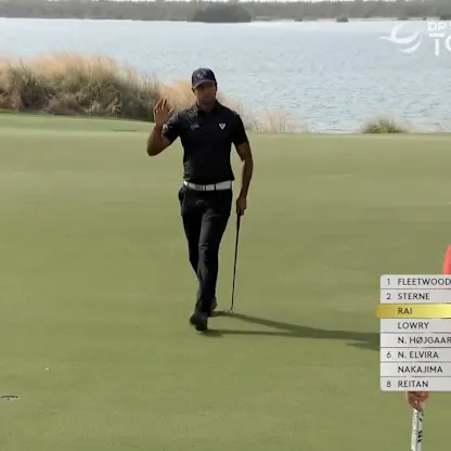 image: Aaron Rai sinks birdie putt at the 17th