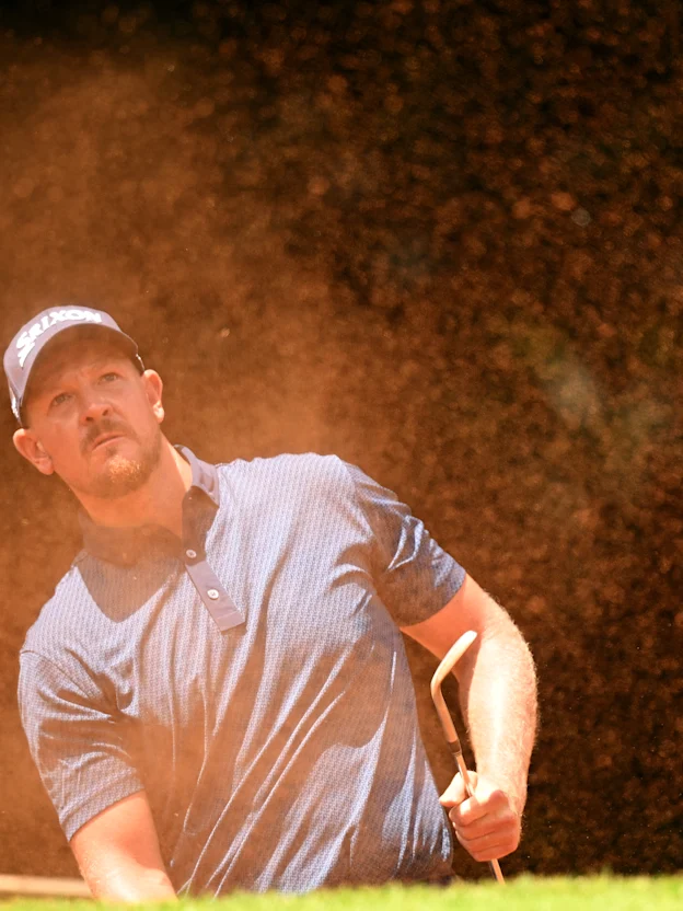 image: WATCH | Jacques Kruyswijk makes chip-in eagle from the sand at the second