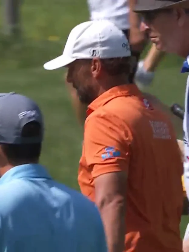 image: Joost Luiten throws a dart at the ninth to become co-leader